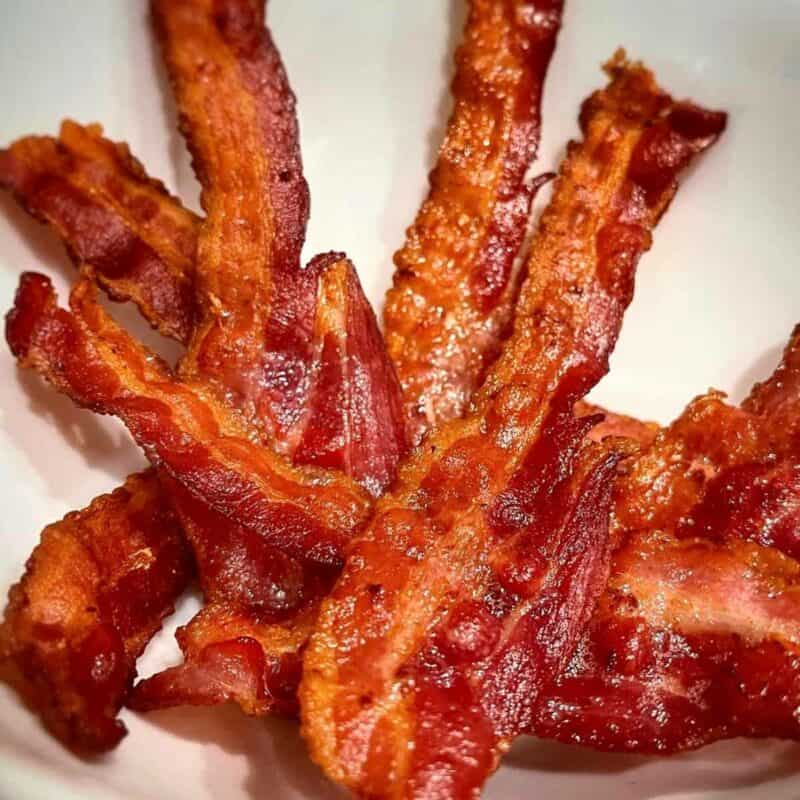 A plate of oven broiled bacon.