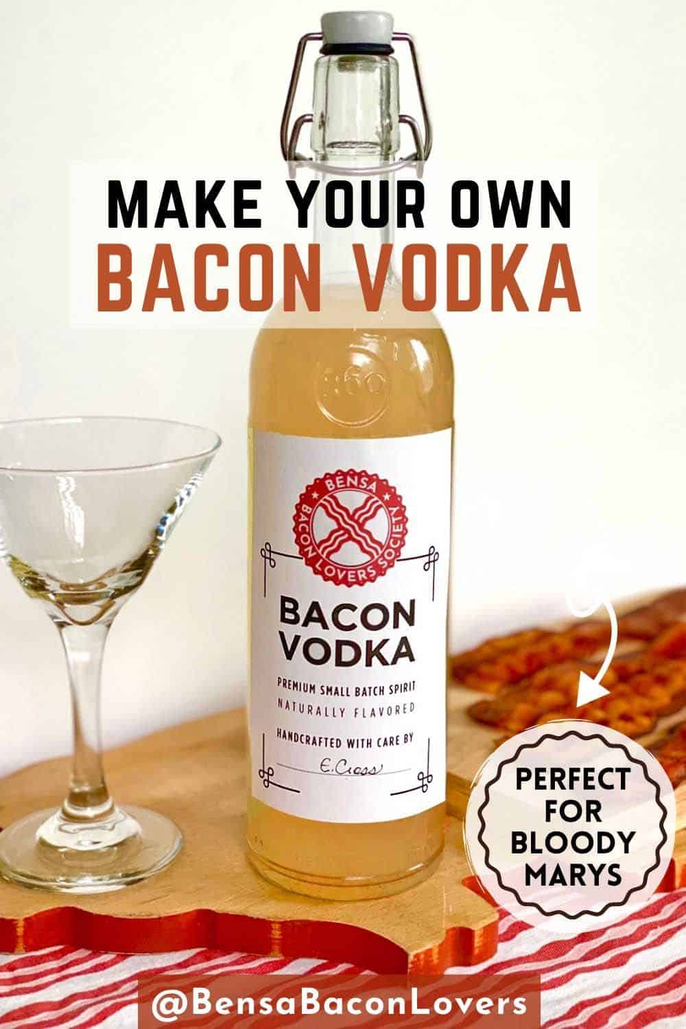 A bottle of bacon vodka on a cutting board near four strips of cooked bacon and an empty martini glass.