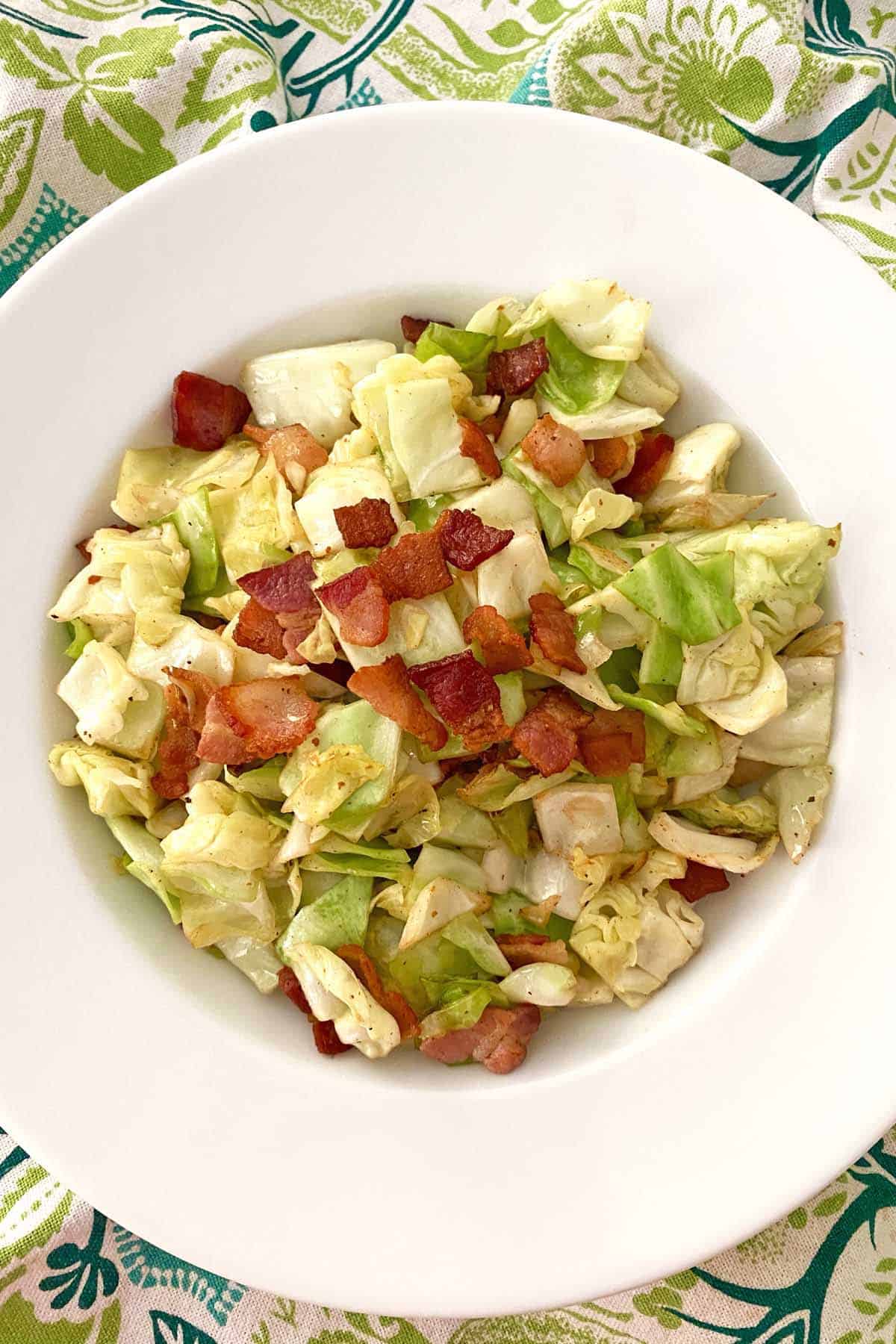 serving dish with finished fried cabbage and bacon
