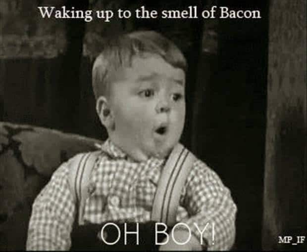 A boy looking excited and text: Waking up to the smell of Bacon - OH BOY!