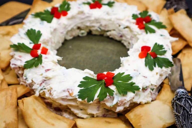 Bacon Scallion Cheese Wreath on a platter surrounded by crackers