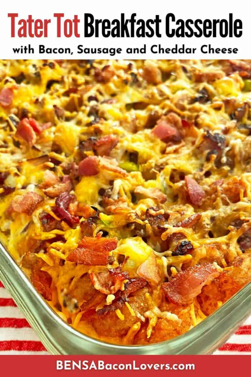 A breakfast casserole of crispy tater tots, bacon, melting cheese, sausage and eggs ready to serve.