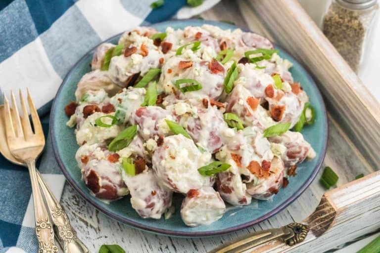 Blue Cheese Red Potato Salad with Bacon in a Blue Bowl.