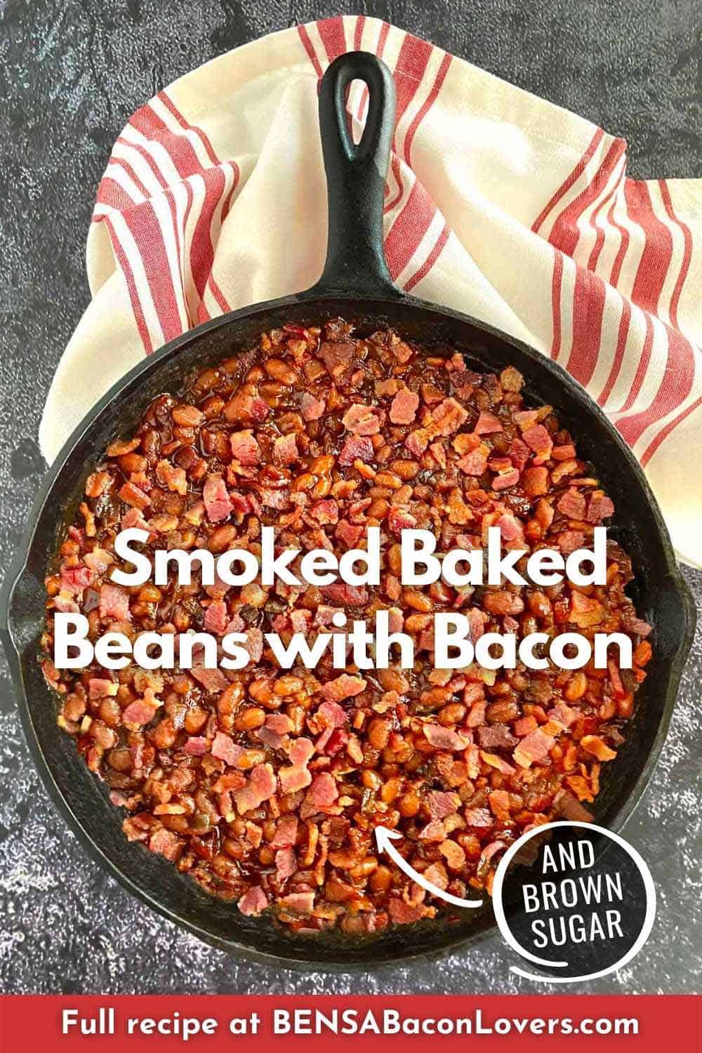 A finished skillet of smoked baked beans with bacon.
