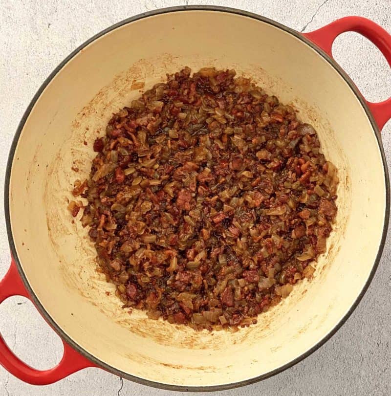 Cooked bacon jam in a heavy pot, ready to be served.
