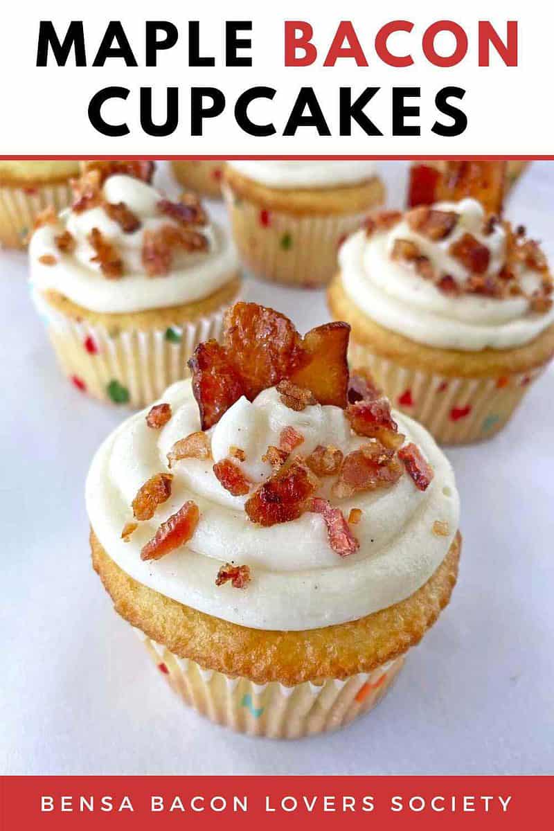 Close up of a maple bacon cupcake with four more cupcakes in the background.