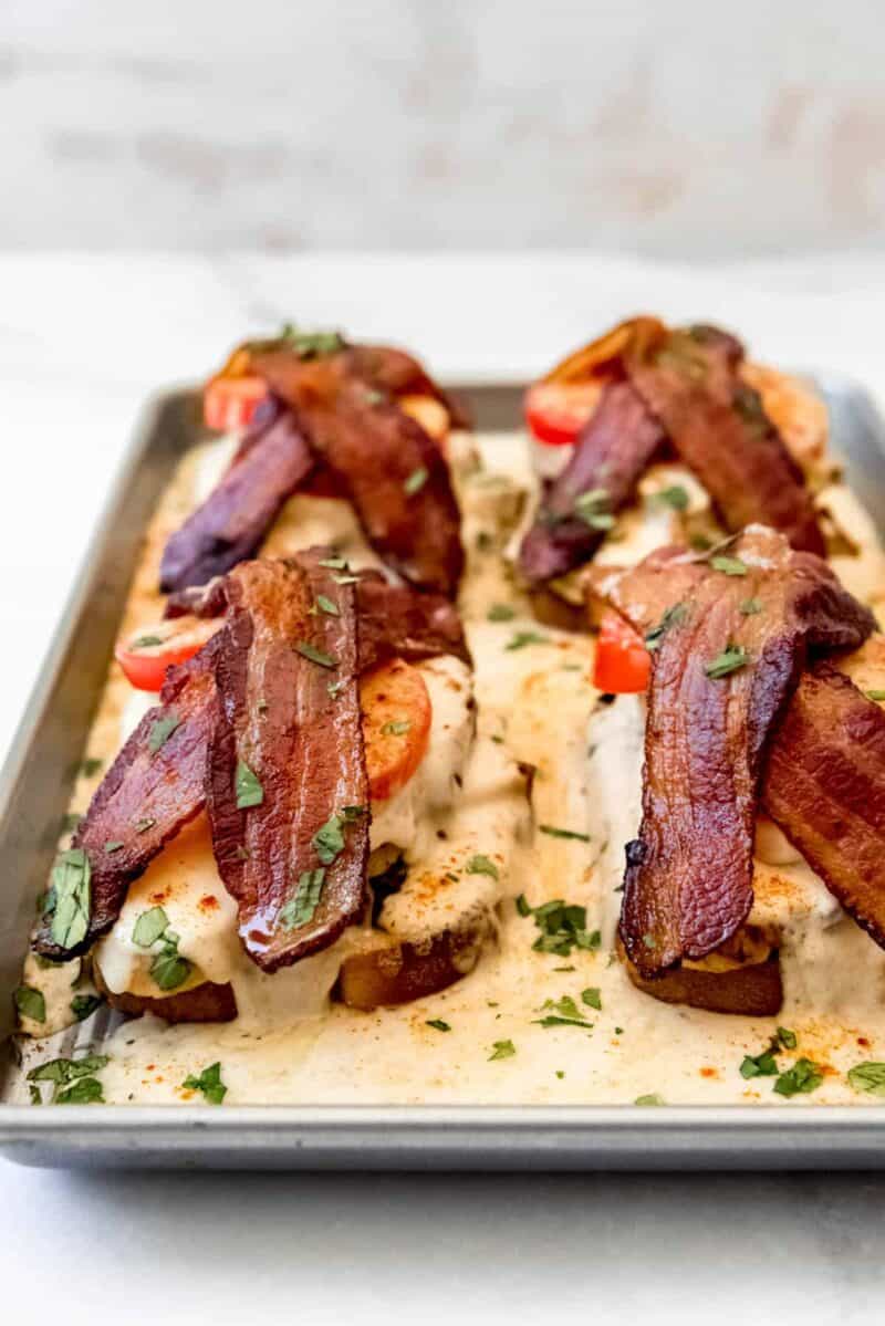 Kentucky Hot Brown Sandwiches topped with bacon.