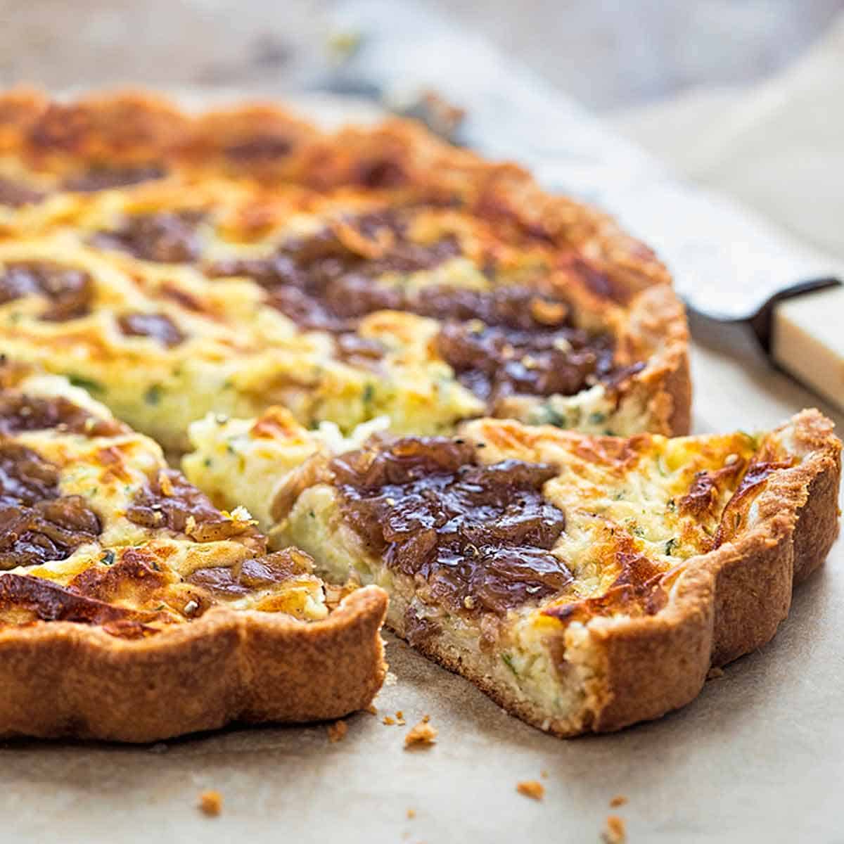 A quiche with dollops of bacon jam on the filling.