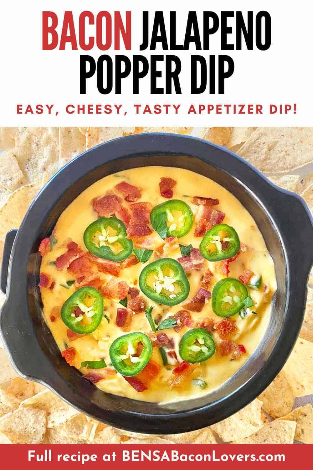 A black crock pot filled with jalapeno popper cheese dip.