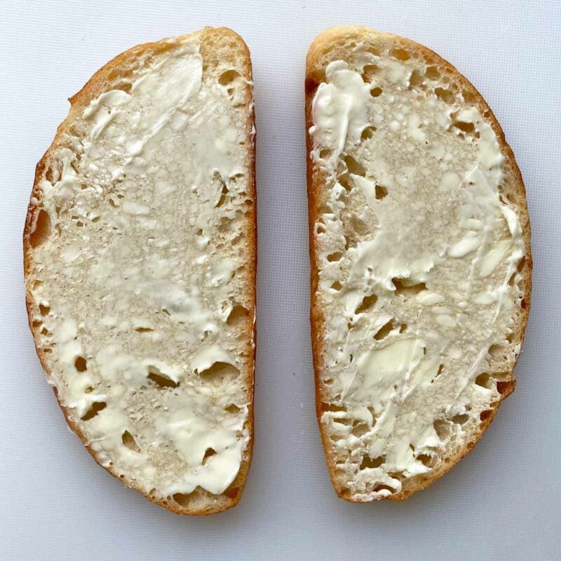 Two slices of buttered bread.