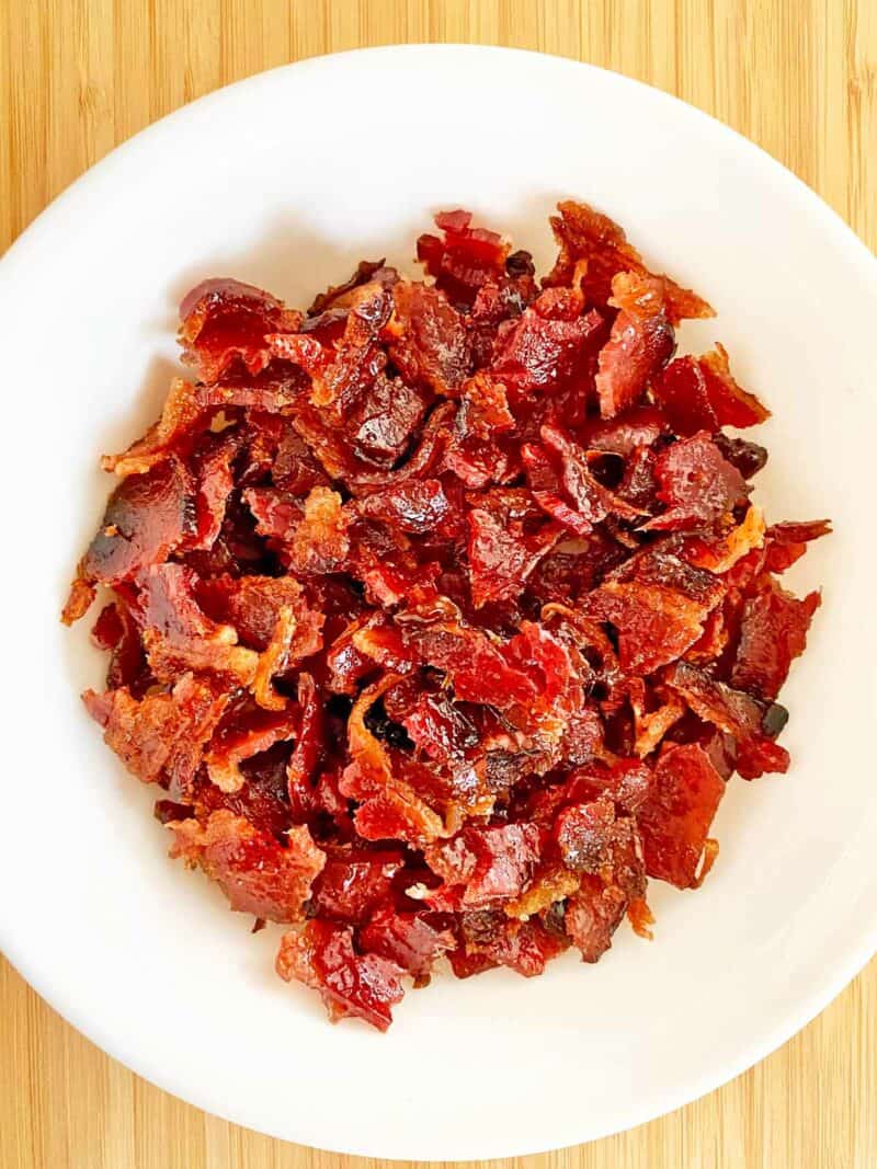A bowl of candied maple bacon topping.