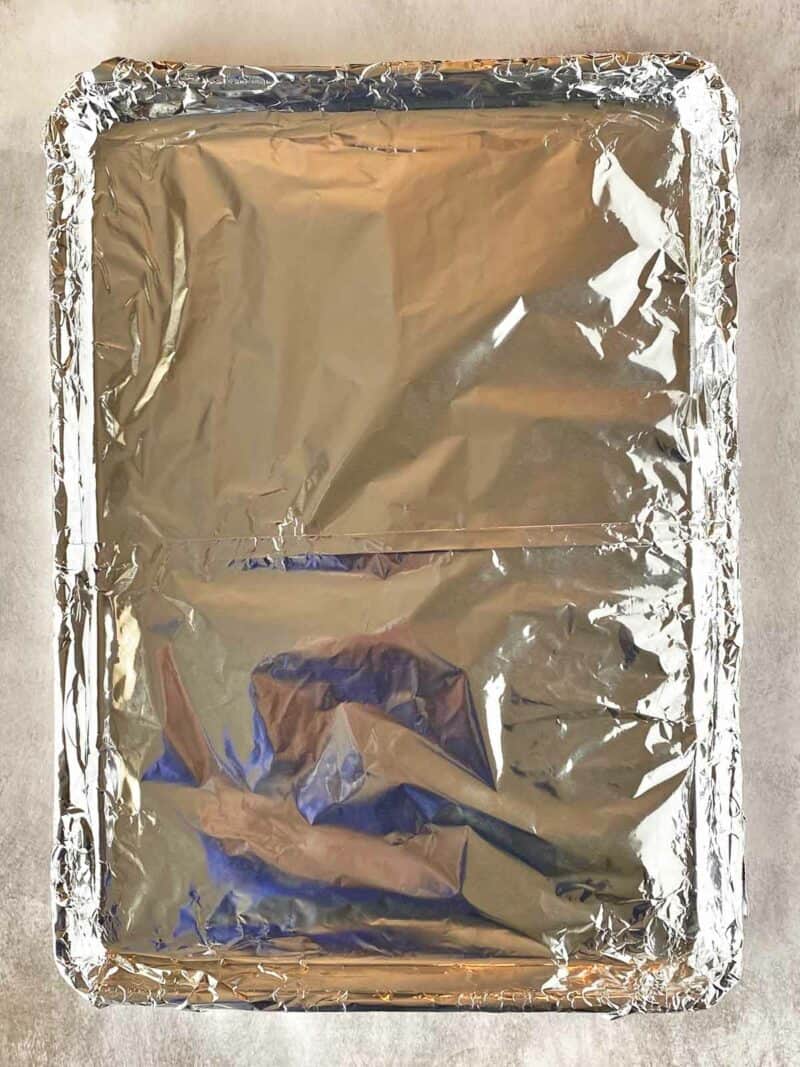 A baking sheet lined with aluminum foil.