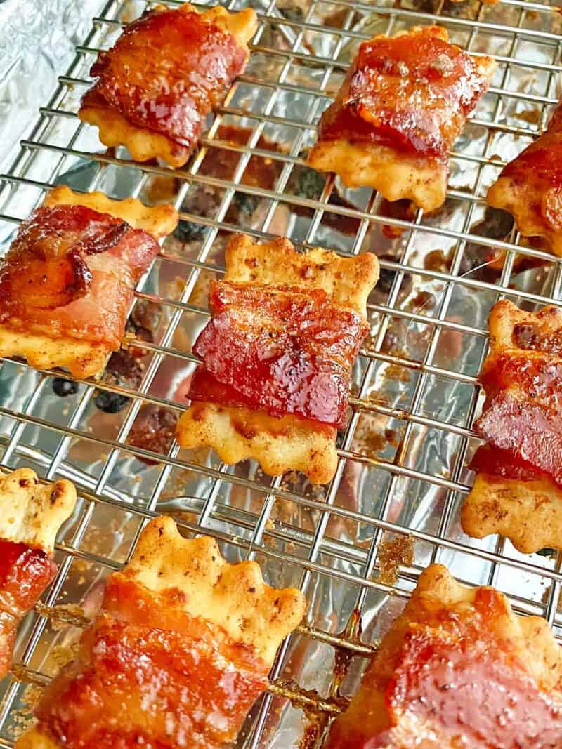 Freshly baked brown sugar bacon crackers still on the baking rack.