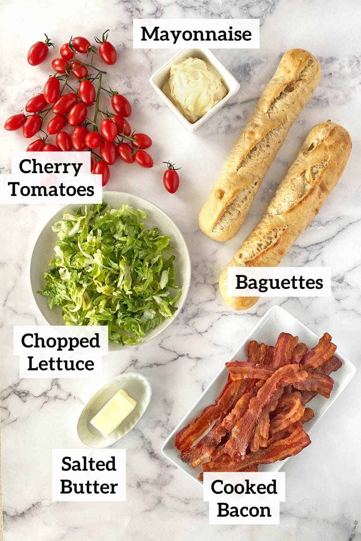 Cherry tomatoes, mayonnaise, baguettes, lettuce, butter and bacon.